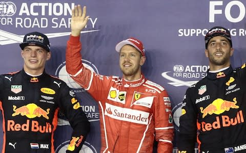 L-R Max Verstappen, Sebastian Vettel and Daniel Ricciardo - Credit: EPA