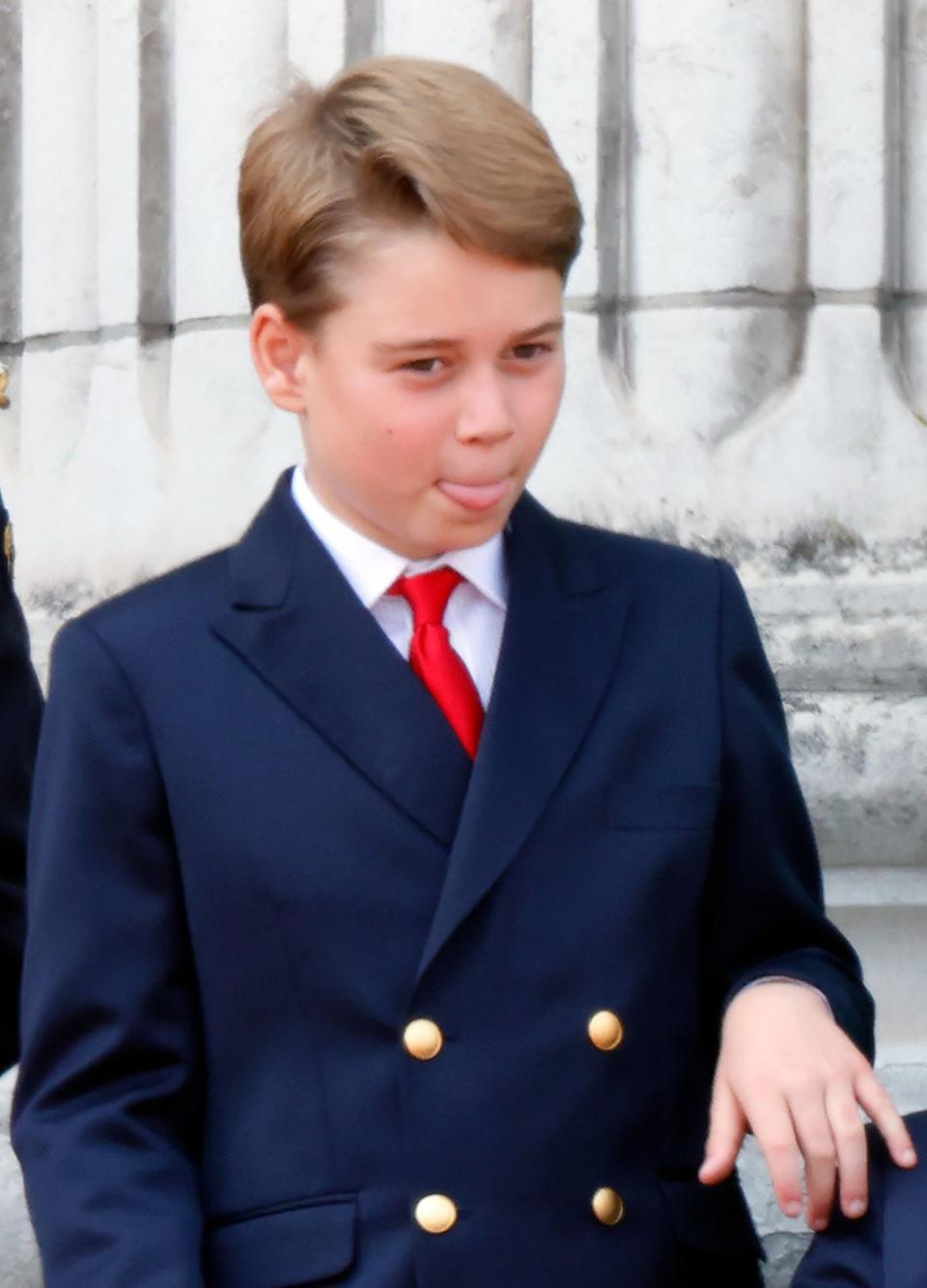 Prince George sticks his tongue out