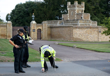 Police officers perform a search a day ahead of the royal wedding between Princess Eugenie and Jack Brooksbank in Windsor, Britain, October 11, 2018. REUTERS/Peter Nicholls