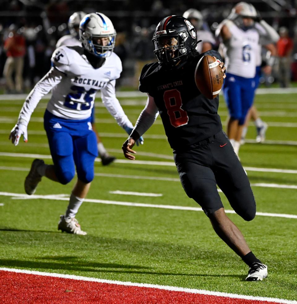Stewarts Creek running back Javarian Otey (8) runs the ball into the end zone for a touchdown against Rockvale during a high school football game on Thursday, Sept. 29, 2022, in Smyrna, Tenn.  