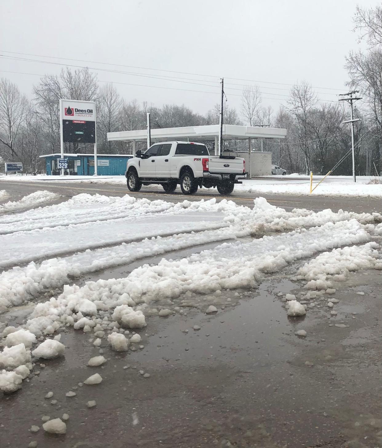 A truck turns at a four-way stop in Middleton, TN on the icy road on Sunday, January 16, 2022 at 9:38 a.m.