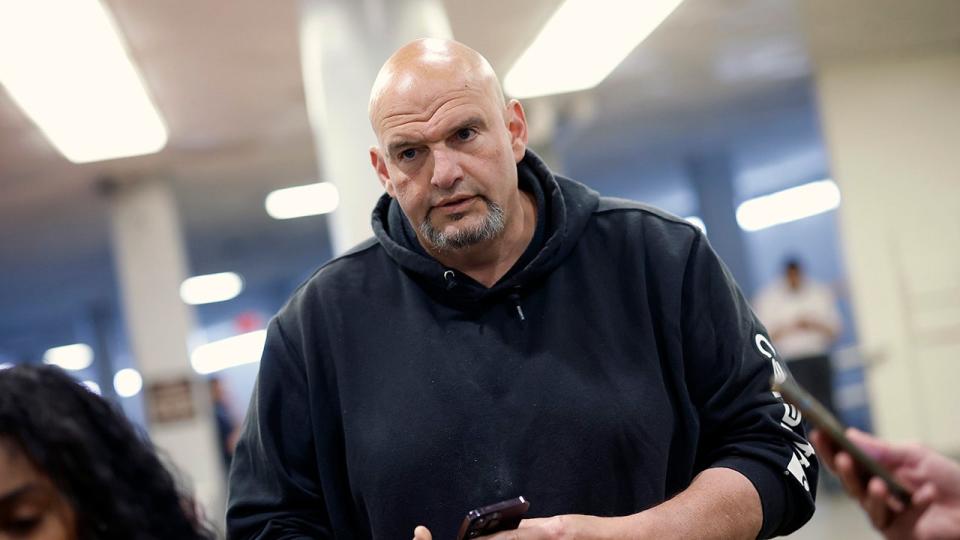 Fetterman in Senate hallway wearing black sweats