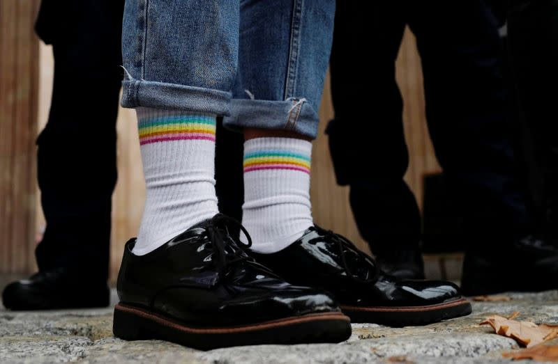 FILE PHOTO: People take part in demonstration for LGBT rights in front of the Education ministry in Warsaw