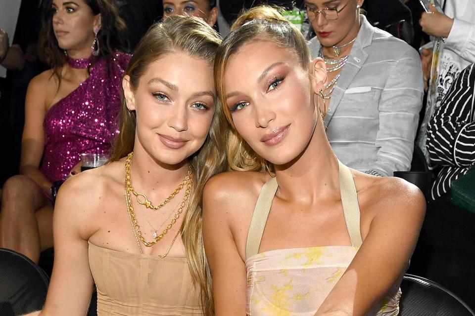 <p>Kevin Mazur/WireImage</p> Gigi Hadid and Bella Hadid