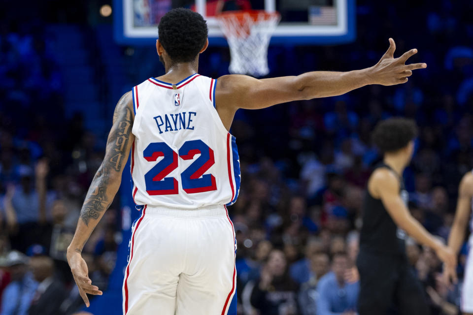Philadelphia 76ers' Cameron Payne reacts after his 3-point basket during the first half of an NBA basketball game against the Brooklyn Nets, Sunday, April 14, 2024, in Philadelphia. (AP Photo/Chris Szagola)