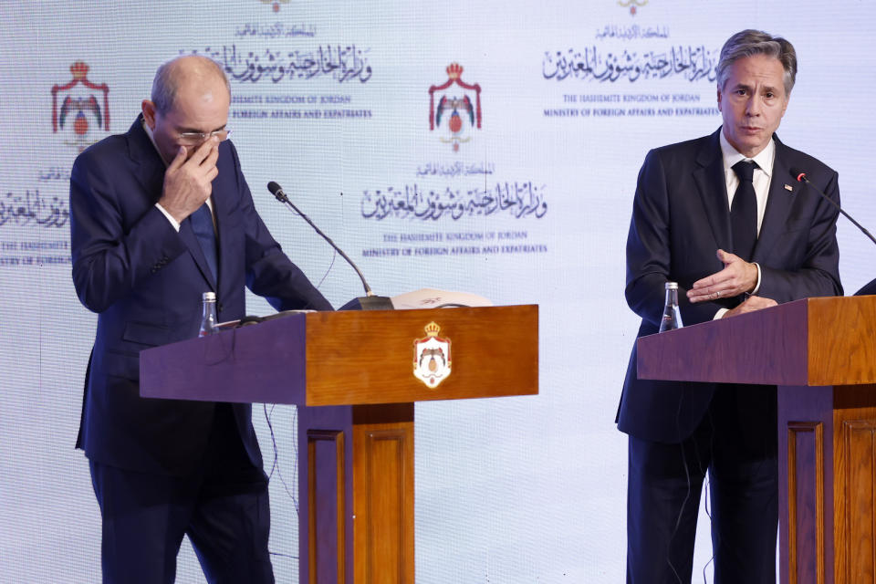 U.S. Secretary of State Antony Blinken, right, and Jordanian Deputy Prime Minister and Foreign Minister Ayman Safadi attend a press conference in Amman, Jordan, Saturday, Nov. 4, 2023. Blinken is making a new push to ease the plight of civilians. He met with Arab foreign ministers on Saturday in Jordan, the day after talks in Israel with Prime Minister Benjamin Netanyahu, who insisted there could be no temporary cease-fire until all hostages held by Hamas are released. (Jonathan Ernst/Pool via AP)