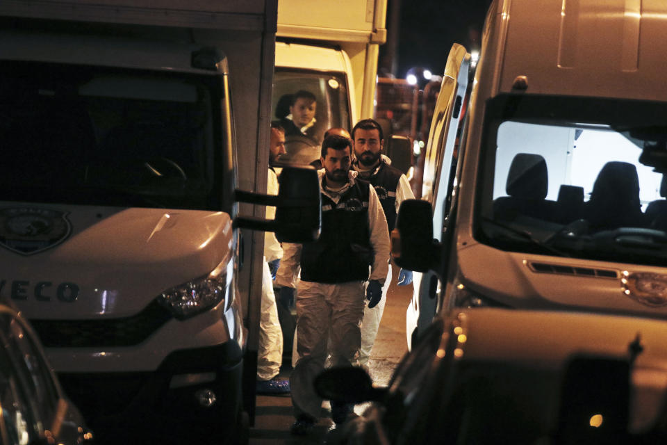 Turkish police officers gather as they prepare to enter the Saudi Arabia's Consulate in Istanbul, Monday, Oct. 15, 2018. Turkish crime scene investigators dressed in coveralls and gloves entered the consulate Monday, nearly two weeks after the disappearance and alleged slaying of Saudi writer Jamal Khashoggi there. (AP Photo/Petros Giannakouris)