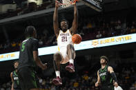 Minnesota forward Pharrel Payne (21) dunks during the first half of an NCAA college basketball game against USC Upstate, Saturday, Nov. 18, 2023, in Minneapolis. (AP Photo/Abbie Parr)