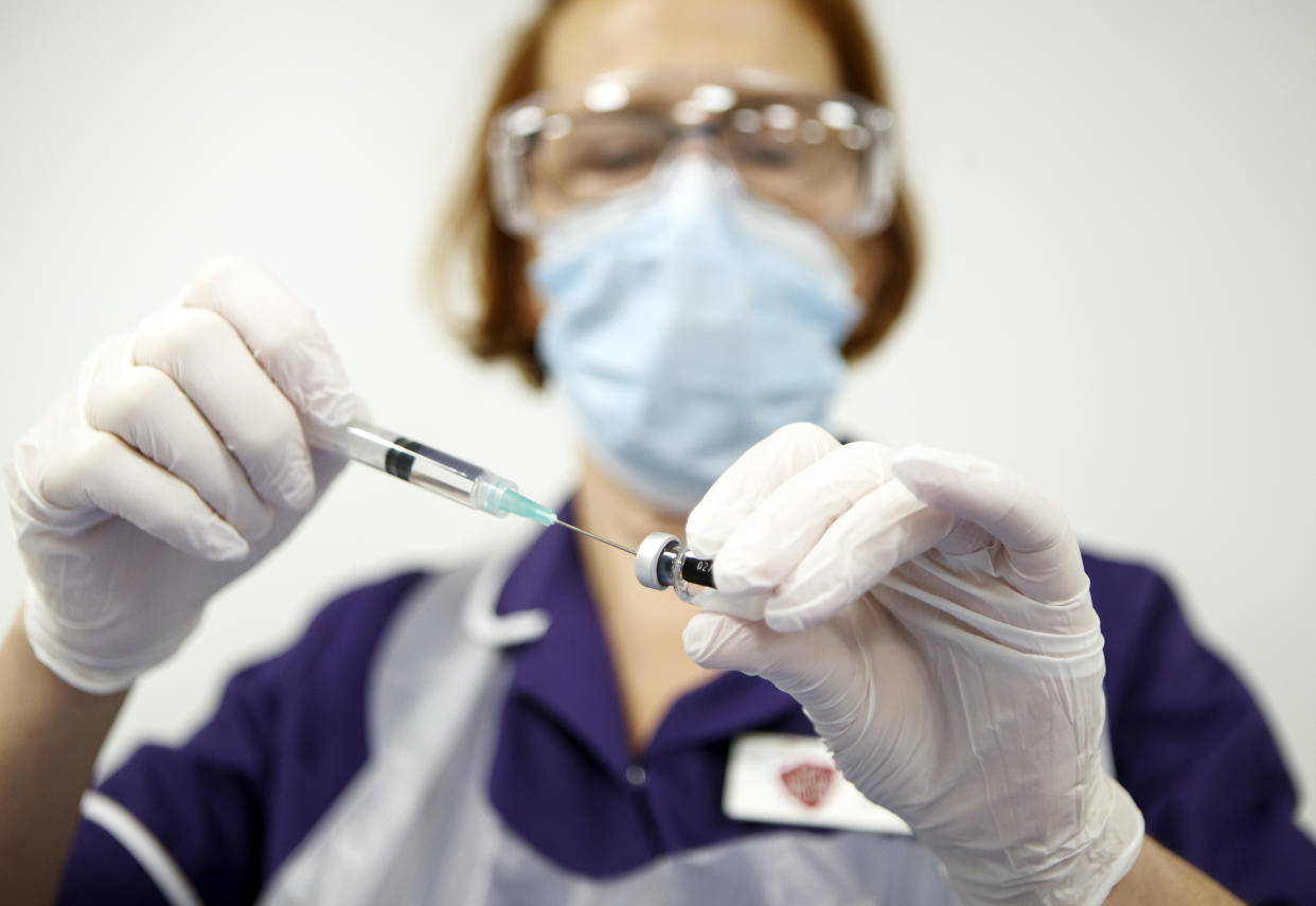 Nurse Pat Sugden prepares the Pfizer-BioNTech vaccine at the Thackray Museum of Medicine in Leeds, the first UK museum to host a COVID-19 vaccination centre, as BioNTech boss Ugur Sahin says he is confident vaccine will work on UK variant. (Photo by Danny Lawson/PA Images via Getty Images)