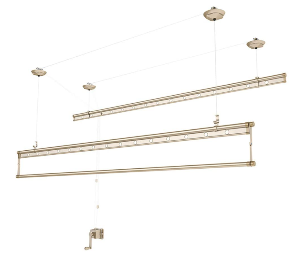 Gold wall and ceiling clothesline with 15 hangers 