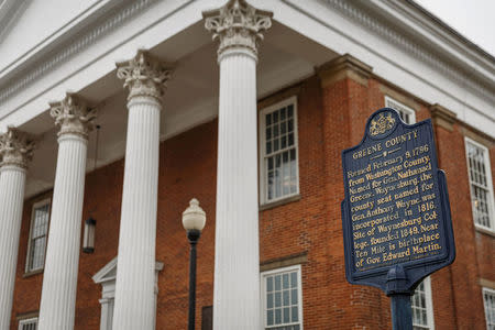 A sign stating the history of Greene County stands outside of the County Court House on High Street in Waynesburg, Pennsylvania, U.S., February 14, 2018. Picture taken February 14, 2018. REUTERS/Maranie Staab