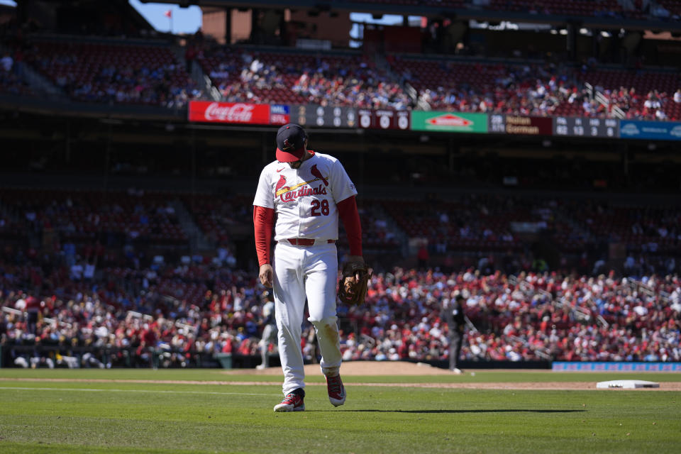 St. Louis Cardinals third baseman Nolan Arenado heads toward the dugout after playing the top half of the ninth inning of a baseball game against the Milwaukee Brewers Sunday, April 21, 2024, in St. Louis. (AP Photo/Jeff Roberson)