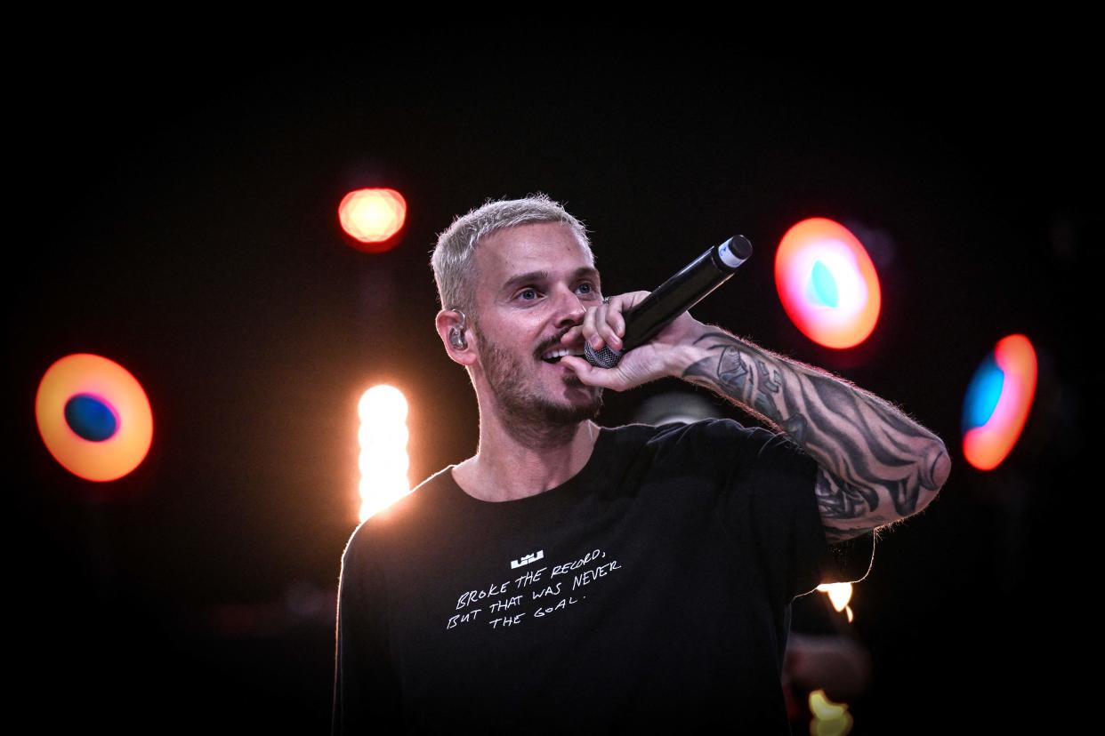 French singer Matt Pokora performs during an exhibition basketball match and music concert at the Gymnase Mado Bonnet in Lyon on October 26, 2023. (Photo by OLIVIER CHASSIGNOLE / AFP) (Photo by OLIVIER CHASSIGNOLE/AFP via Getty Images)