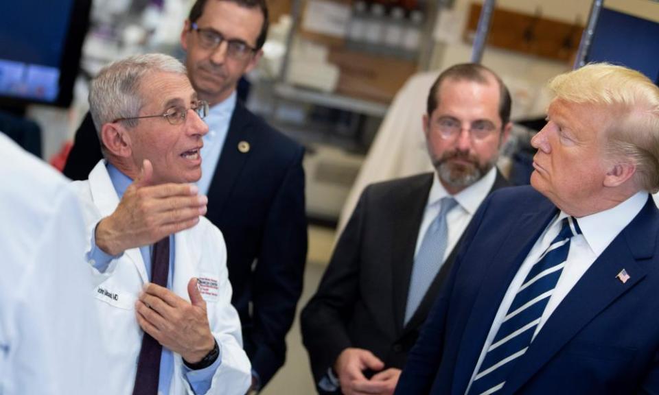 Donald Trump and Dr Fauci at the National Institutes of Health’s Vaccine Research Center in Maryland, 3 March.