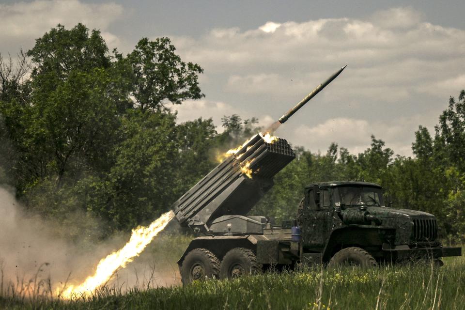 Ukrainian troops fire with surface-to-surface rockets MLRS towards Russian positions at a front line in the eastern Ukrainian region of Donbas on June 7, 2022. (Photo by ARIS MESSINIS / AFP) (Photo by ARIS MESSINIS/AFP via Getty Images)