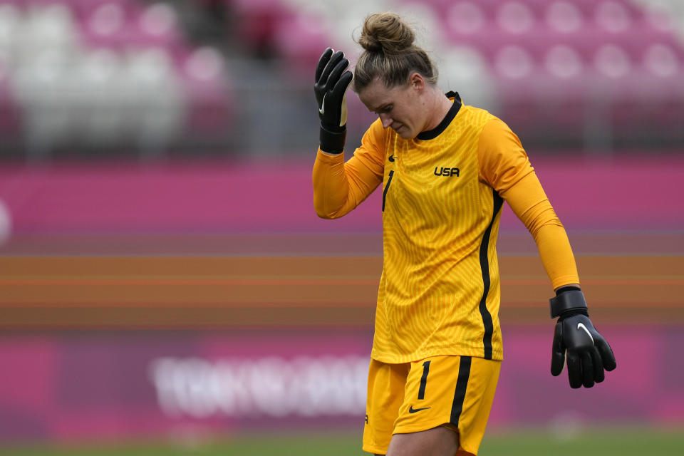 United States' goalkeeper Alyssa Naeher leaves the field after being injured during a women's semifinal soccer match against Canada at the 2020 Summer Olympics, Monday, Aug. 2, 2021, in Kashima, Japan. (AP Photo/Fernando Vergara)