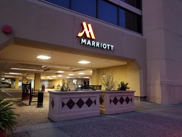 Walnut Creek, California, United States - October 09, 2018:  Facade with logo at night at Marriott hotel in downtown Walnut Creek, California, October 9, 2018