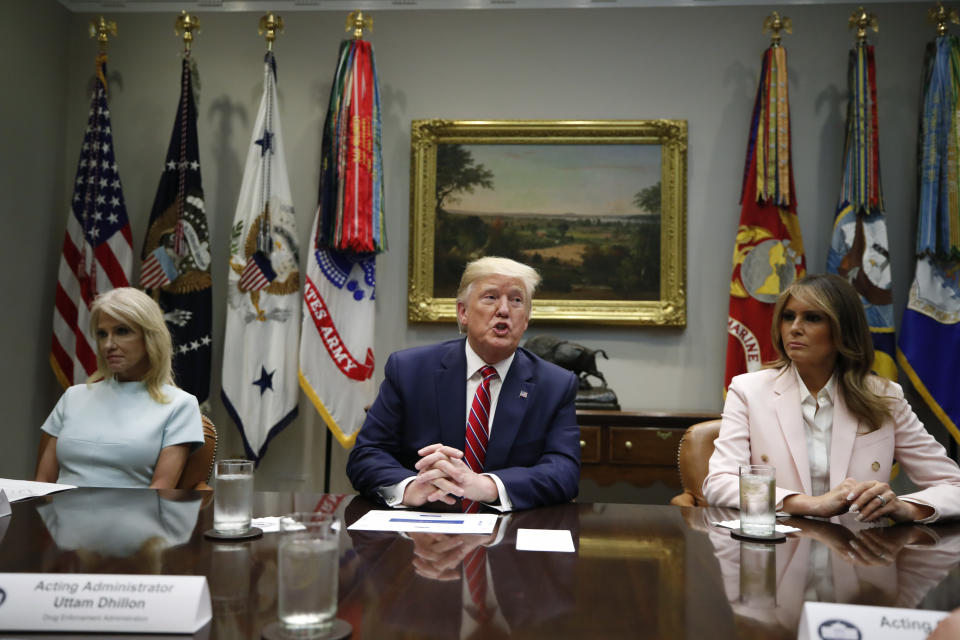 President Donald Trump, first lady Melania Trump, Counselor to the President Kellyanne Conway, left, and others attend a briefing on efforts to combat the opioid crisis in the Roosevelt Room of the White House, Wednesday, June 12, 2019, in Washington. (AP Photo/Alex Brandon)