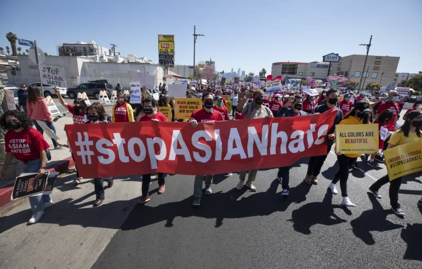 LOS ANGELES, CA - MARCH 27: Hundreds participated in a "Stop Asian Hate" rally in Koreatown on Saturday, March 27, 2021. (Myung J. Chun / Los Angeles Times)