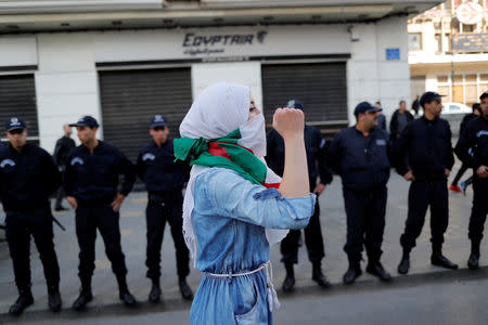 A student protests against Algeria's President Abdelaziz Bouteflika, in Algiers, Algeria March 10, 2019. REUTERS/Zohra Bensemra