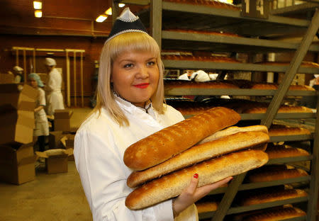 Julia Perminova, a dough specialist, who is also a model of the SibPlus Models agency and a participant of the Miss Doughnut 2016 beauty competition, works at a bakery in Krasnoyarsk, Siberia, Russia March 3, 2017. REUTERS/Ilya Naymushin