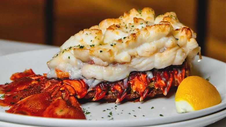 Lobster tail with lemon wedge