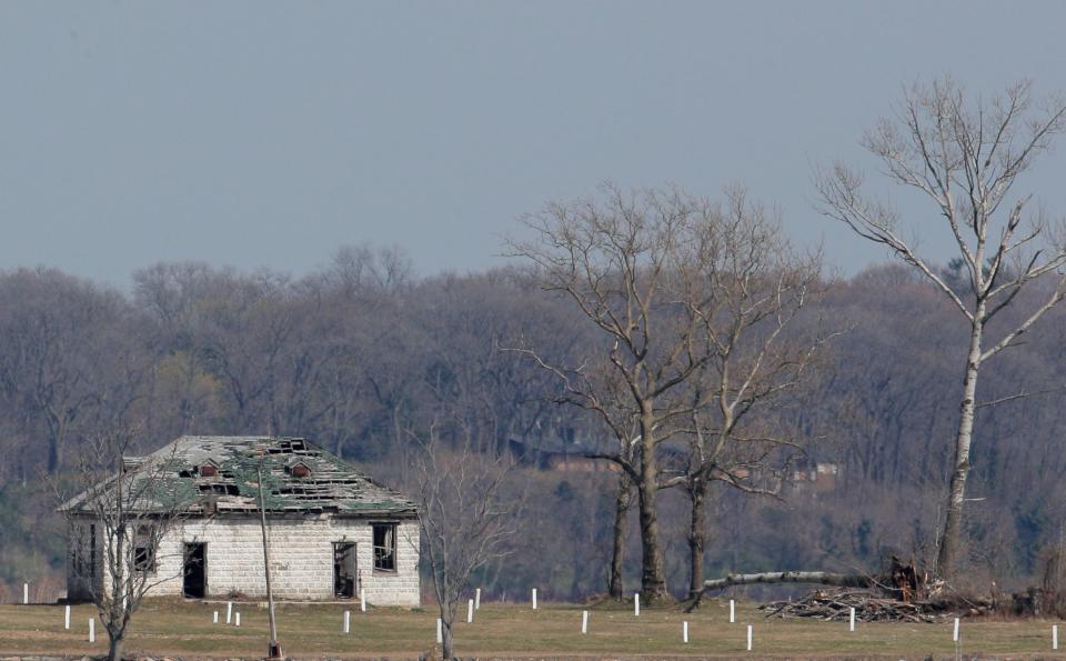 coronavirus covid 19 white marker crumbling building hart island potters field city cemetery nyc new york bronx april 7 2020 2020 04 07T194842Z_1562988995_HP1EG471J156D_RTRMADP_3_HEALTH CORONAVIRUS USA BODIES.JPG