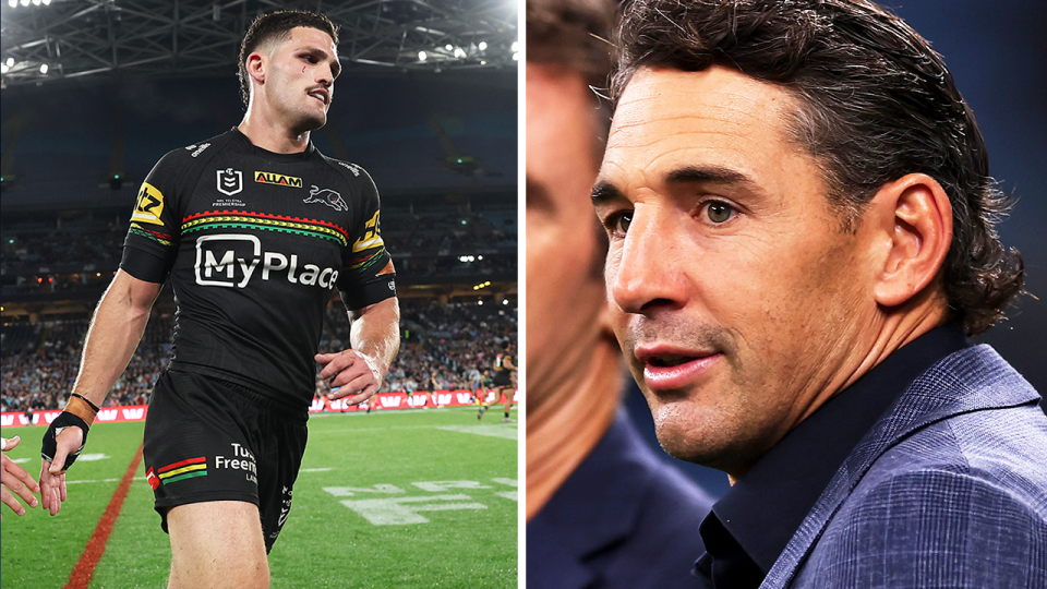 Nathan Cleary walks off the field and Billy Slater during commentary.