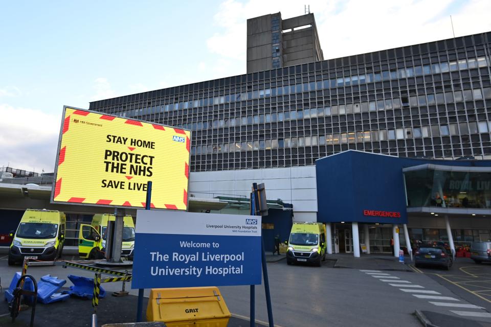 An NHS digital display shows a Covid warning outside Royal Liverpool University hospital in Liverpool, north west England on January 5, 2021, as Britain enters a second national lockdown to combat the spread of COVID-19. - England on Tuesday entered a strict national lockdown aimed at stemming a steep rise in coronavirus cases that a senior government minister warned could last into March. (Photo by Paul ELLIS / AFP) (Photo by PAUL ELLIS/AFP via Getty Images)