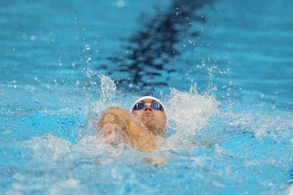 Carson Foster swims during the Men's 400 individual medley preliminary heat Sunday, June 16, 2024, at the US Swimming Olympic Trials in Indianapolis. (AP Photo/Michael Conroy)