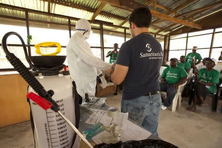 A Samaritan's Purse medical personnel demonstrates personal protective equipment to educate volunteers on the Ebola virus in Liberia, in this undated handout photo courtesy of Samaritan's Purse. REUTERS/Samaritan's Purse/Handout via Reuters