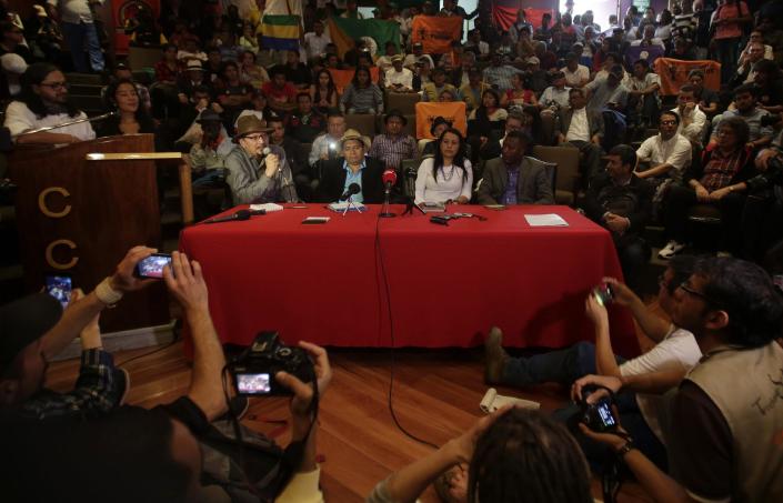 Delegates from Colombian social movements give a press conference in support the peace talks between The National Liberation Army (ELN) and Colombia's government, starting today in Quito, Ecuador, Tuesday, Feb. 7, 2017. (AP Photo/Dolores Ochoa)