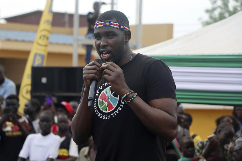 South Sudan basketball captain, Kuany Ngor Kuany speaks to supporters, at Juba International airport, South Sudan, Tuesday, Sept. 5, 2023. Basketball has united the South Sudanese. Basketball has united the South Sudanese. The country which gained its independence just 12 years ago is still celebrating the men’s national team after its first-ever qualification for the Olympics. South Sudan will play at the Paris Olympics as the automatic qualifier from Africa thanks to a 101-78 win over Angola a week ago at the basketball World Cup in the Philippines. (AP Photo Samir Bol)