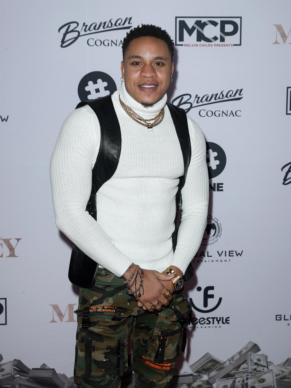 Rotimi attends the "For The Love Of Money" Houston Premiere at Regal Edwards Greenway Grand Palace ScreenX & RPX on November 10, 2021 in Houston, Texas.