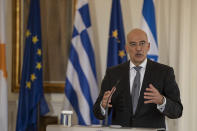 Greek Foreign Minister Nikos Dendias speaks during a join news conference with Israel's counterpart Gabi Ashkenazi and Cypriot Foreign Minister Nikos Christodoulides after a meeting between the foreign Ministers of Greece , Israel and Cyprus in Athens, on Tuesday, Oct. 27, 2020. (AP Photo/Petros Giannakouris)