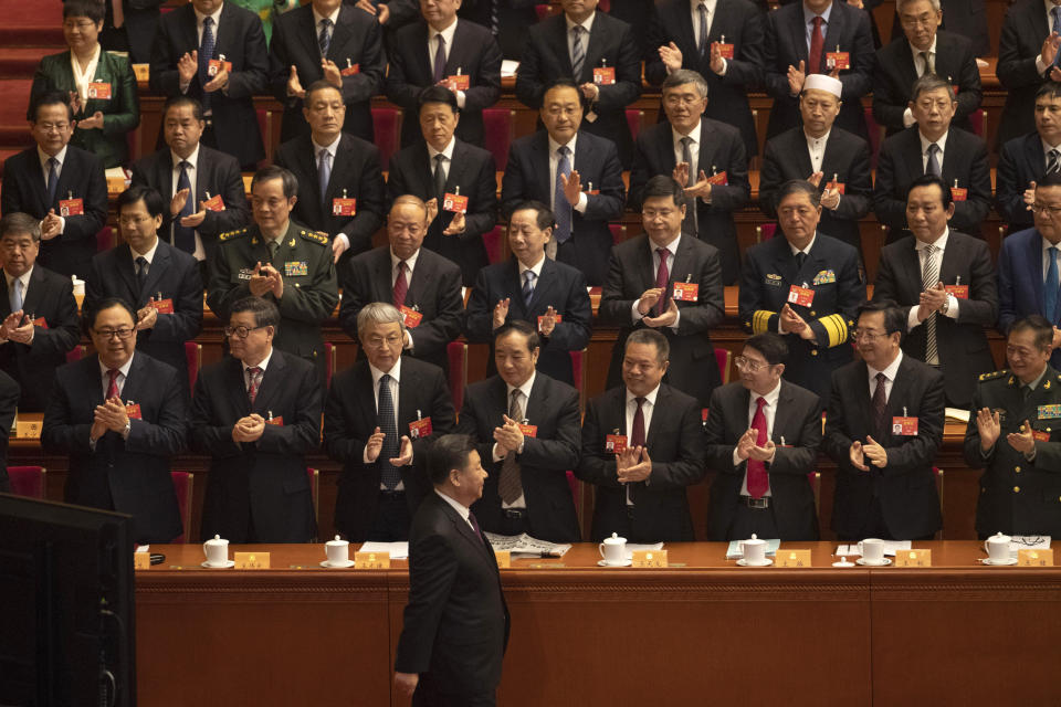 Chinese President Xi Jinping arrives for the opening session of the Chinese People's Political Consultative Conference in Beijing's Great Hall of the People, Sunday, March 3, 2019. (AP Photo/Ng Han Guan)