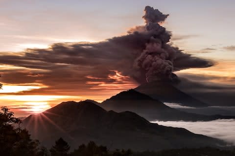 Mt Agung has been on alert for months - Credit: REUTERS/SOCIAL MEDIA