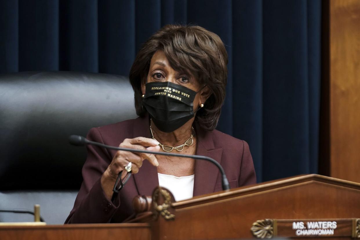 House Financial Services Committee Chairman Maxine Waters, D-Calif., arrives for a House Financial Services Committee hearing on Capitol Hill in Washington, Wednesday, Dec. 2, 2020. 