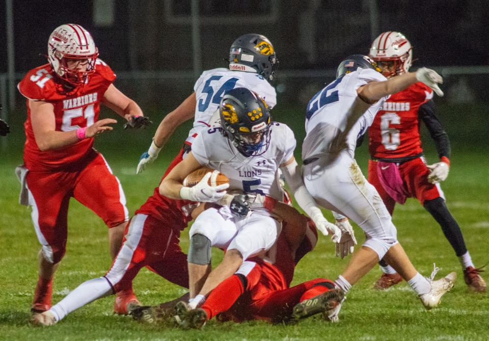 New Hope-Solebury's Julian Estes #5 is stopped in the first quarter of the New Hope at Bristol playoff football game Friday, November 03, 2023. Bristol defeated New Hope, 7-6, to win the District One Class 2A football title. (Photo by William Thomas Cain)