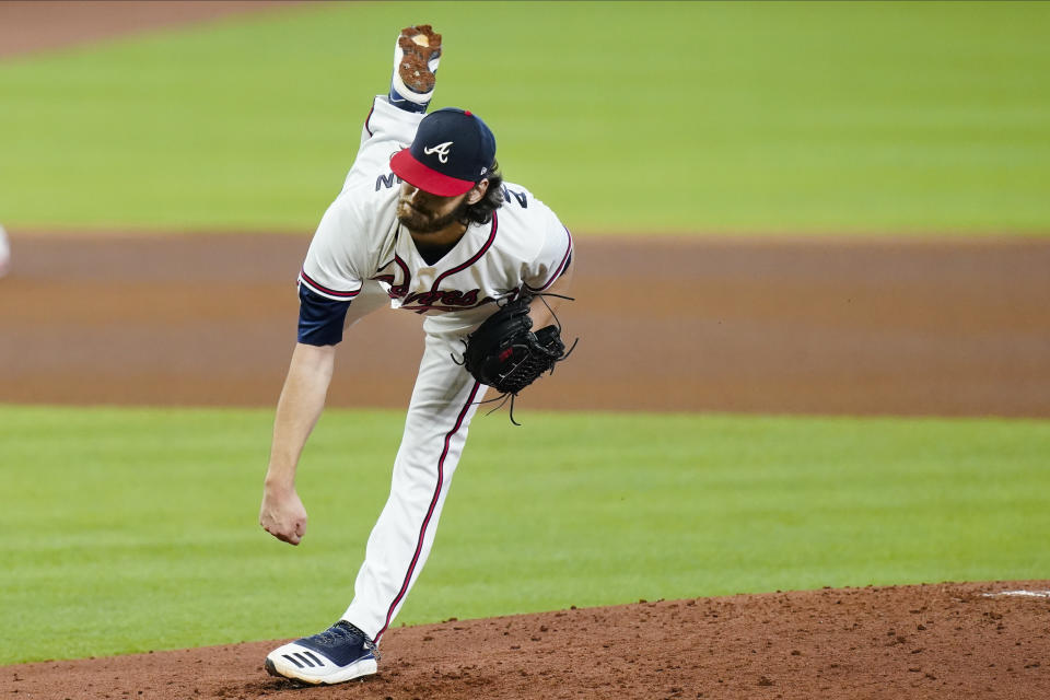 Atlanta Braves' Ian Anderson delivers a pitch during the fourth inning in Game 2 of a baseball National League Division Series against the Miami Marlins Wednesday, Oct. 7, 2020, in Houston. (AP Photo/Eric Gay)