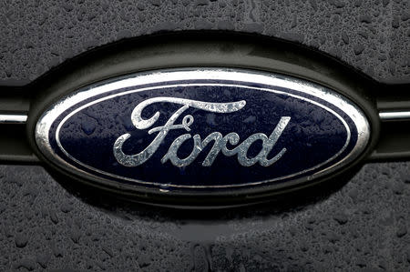 FILE PHOTO: The Ford logo is pictured at the Ford Motor Co plant in Genk,Belgium December 17, 2014. REUTERS/Francois Lenoir/File Photo
