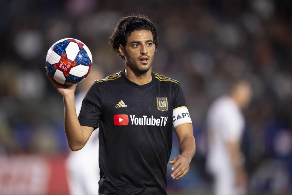 Jul 19, 2019; Carson, CA, USA; Los Angeles FC forward Carlos Vela (10) heads to a corner kick during the first half against the LA Galaxy at Dignity Health Sports Park. Mandatory Credit: Kelvin Kuo-USA TODAY Sports