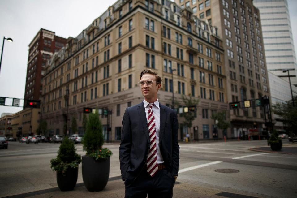 Ben Shipp poses in downtown Cincinnati on Wednesday, Sept. 23, 2020. Shipp was forced to move back into his parents' home in Dry Ridge, Ky., after his dream internship with Disney was abruptly cut short as Disney World and the surrounding resorts closed in the spring. Shipp had goals of working his way up in the company and starting his career before the pandemic put the brakes on his work. 