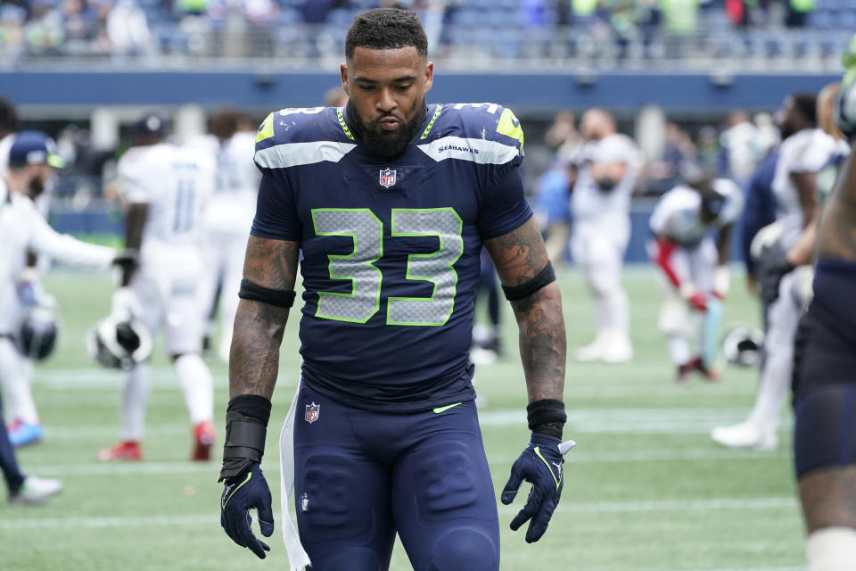 Seattle Seahawks strong safety Jamal Adams walks off the field after the Seahawks lost 33-30 to the Tennessee Titans during in overtime an NFL football game, Sunday, Sept. 19, 2021, in Seattle. (AP Photo/Elaine Thompson)