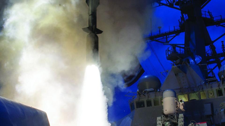 The U.S.  Navy destroyer John Paul Jones launches a Standard Missile-6 during a live-fire test of the ship's Aegis weapons system. (U.S. Navy)