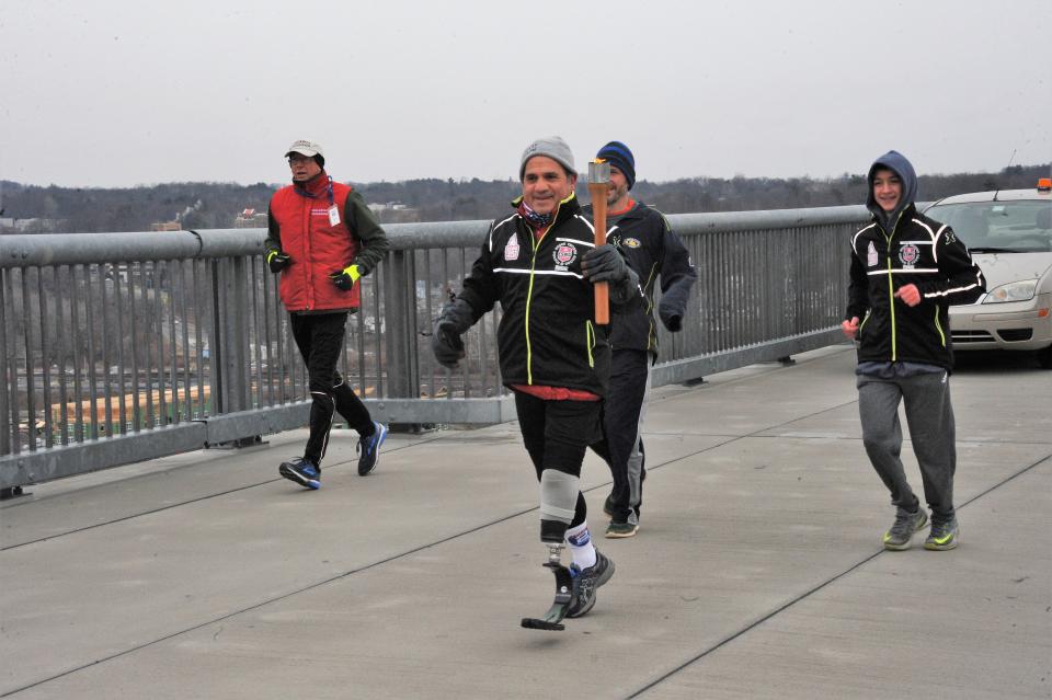The Empire State Winter Games Torch Run was conducted on the Walkway Over the Hudson prior to the 2018 Games. PHOTO PROVIDED