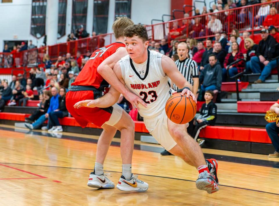 Highland’s Brenden Gelly drives the baseline during Friday night’s Mississippi Valley Conference game against Triad. The Knights ultimately posted a 50-37 victory.