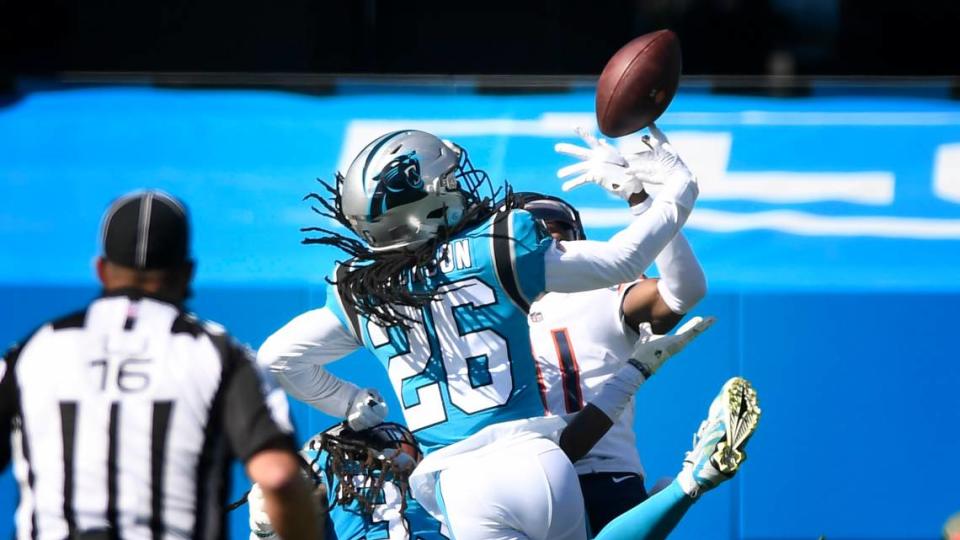 Carolina Panthers cornerback Donte Jackson (26) battles for the ball against Chicago Bears wide receiver Darnell Mooney (11) in first half action Sunday, Oct. 18, 2020.