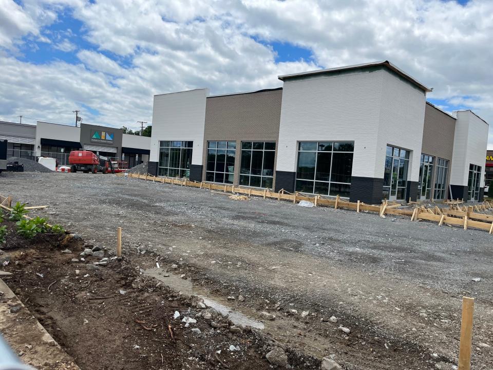 An outparcel building under construction as part of Volunteer Village in Hendersonville.