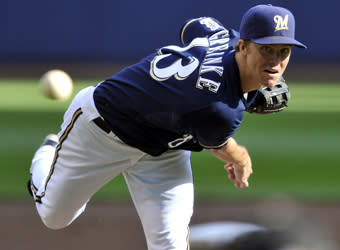 Zach Greinke delivers a pitch during the first inning of Game 1 of the NLCS against the Cardinals